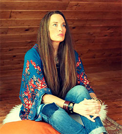 Kerri Powers Sitting in Her Home